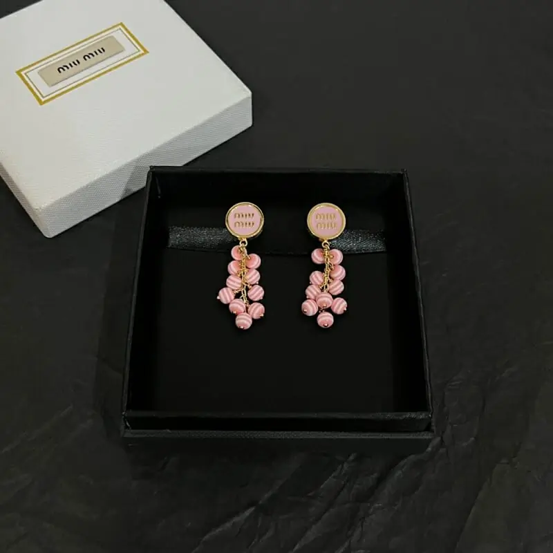 miu miu boucles doreilles pour femme s_12240512